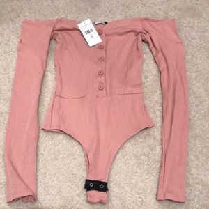 Fashion Nova rose pink body suit.